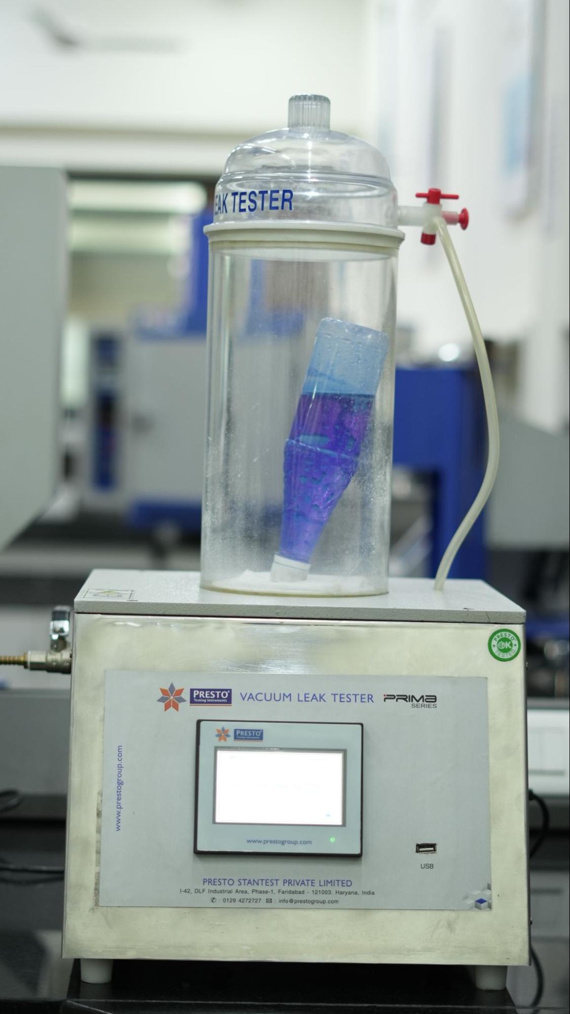 Vacuum leak tester